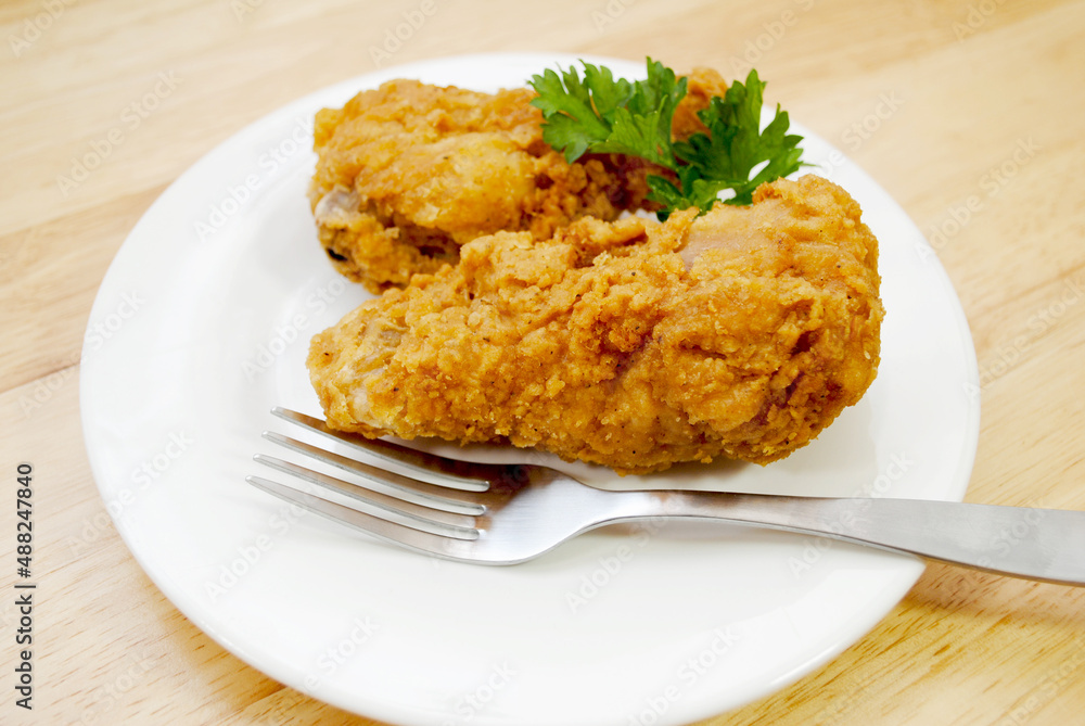 Eating Southern Fried Chicken on a White Plate Eating Southern Fried Chicken on a White Plate