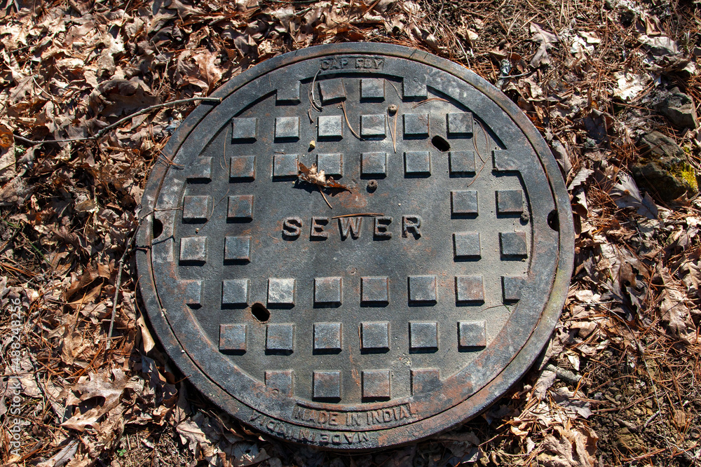 rusty manhole cover