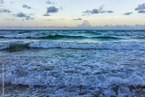 Hollywood Beach Miami  Florida Atlantic ocean stormy summer weather at dawn sunrise with blue hour sky in morning surf waves and nobody