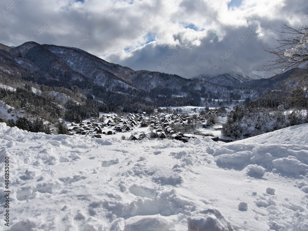 Shirakawago, Japan - February 18, 2022 : Snow-covered Shirakawago village in winter recorded on February 18, 2022. Beautiful Traditional houses (thatched roof or gassho-zukuri). Shirakawago is one of 