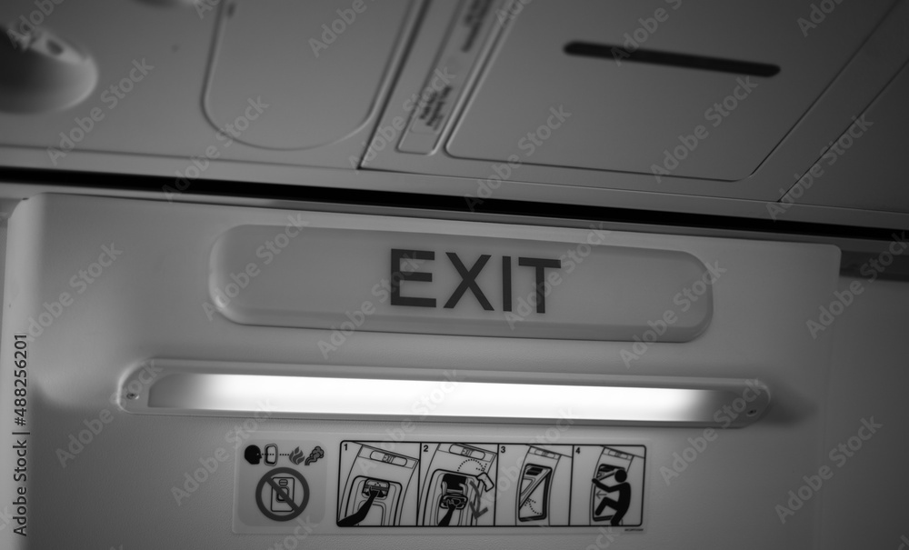 Inscription exit inside the cockpit in black and white Inscription exit inside the cockpit in black and white