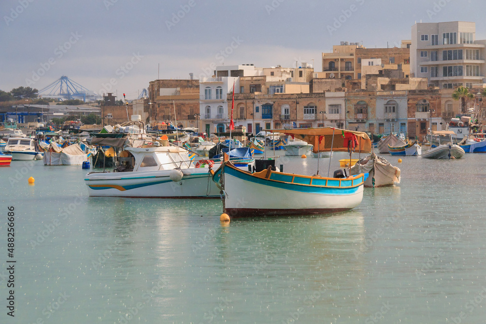 Marsaxlokk fishing boats Malta - Raining