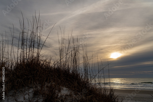 Gray Day Sunrise on Ocean with Dunes