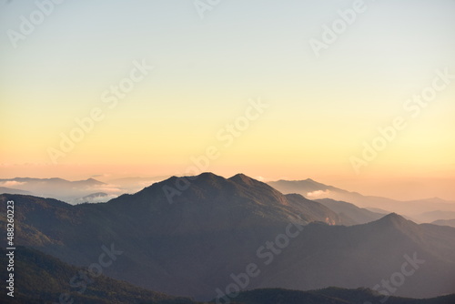 mountain peak at sunset  © tharathip