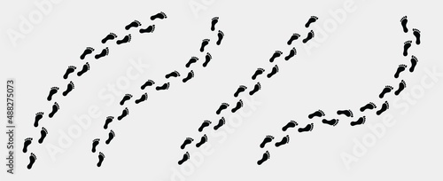 Set of different black human footprint routes isolated on white background. Footprints trail vector set.