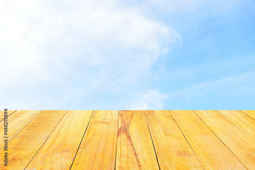 Blue sky and white clouds for background.wood background.
