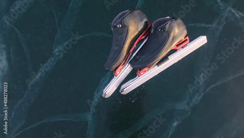 Fotografie The skates boots are on the ice