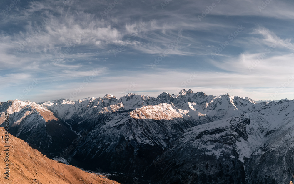 Panoramic view of mountain range of the Caucasus Mountains. View from the top of the mountain. Elbrus region