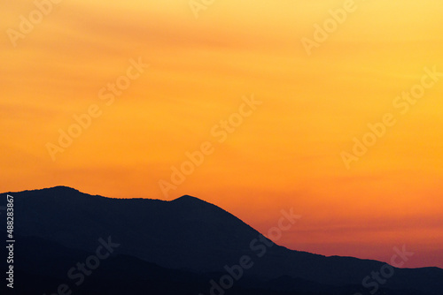 Afterglow in hilly terrain - Twilight with mountains in the foreground