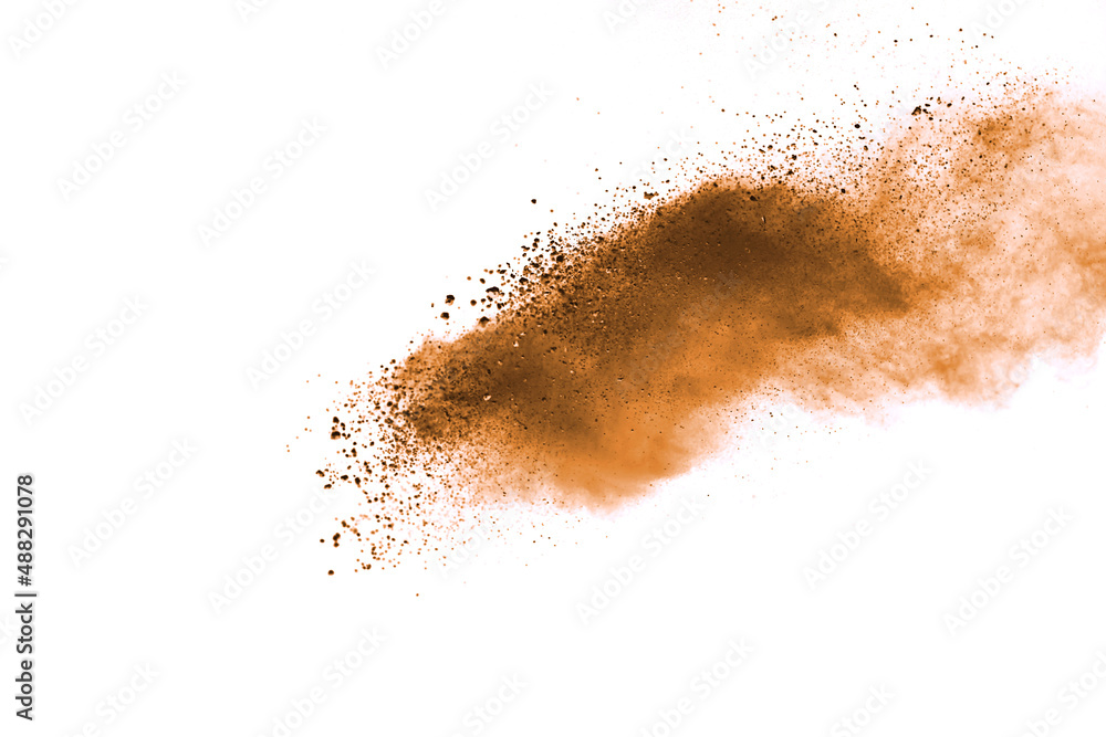Brown powder explosion isolated on white background. Brown powder explosion isolated on white background.