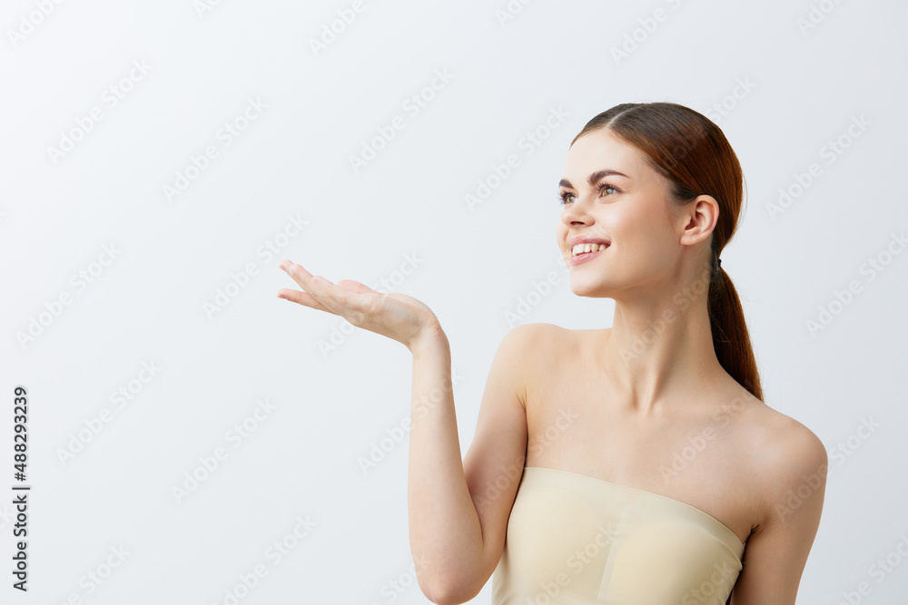 pretty woman red hair bare shoulders cosmetics skincare isolated background pretty woman red hair bare shoulders cosmetics skincare isolated background