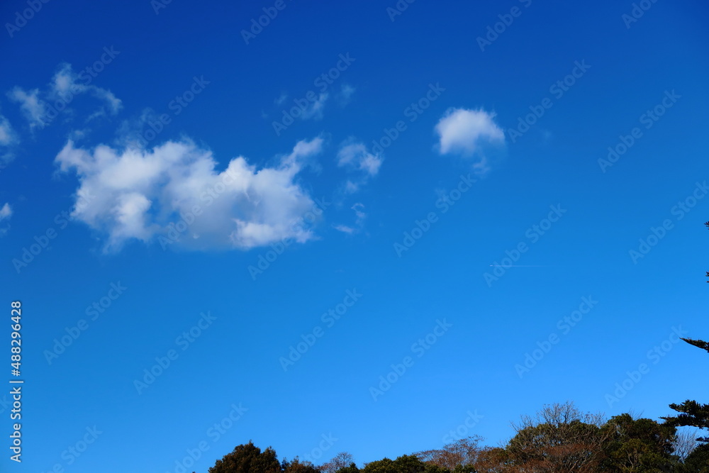 Blue sky background with some small clouds. Blue sky background with some small clouds.
