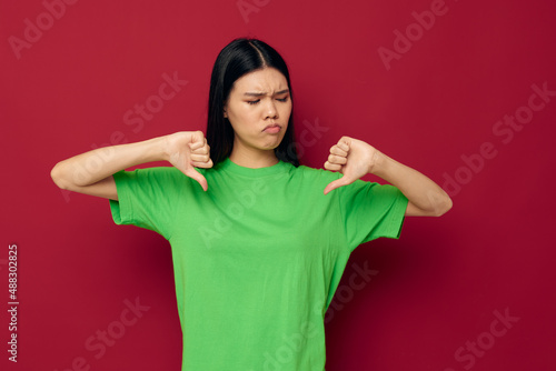 Wallpaper Mural pretty brunette emotions posing gesture hands grimace isolated background unaltered Torontodigital.ca