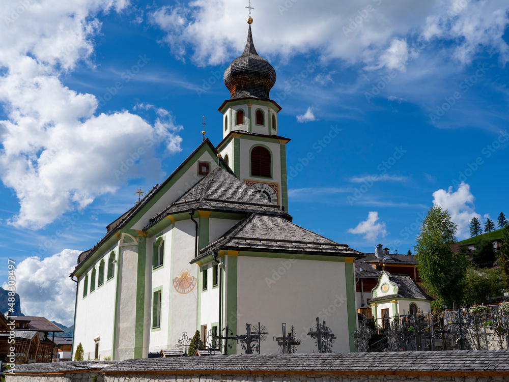 San Cassiano, Alta Badia, Italy. The church in the center of the town. Typical Tyrolean architecture. The building dates back to 1782. Tourists attraction. Summer time