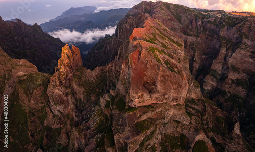 Mountain peaks in overcast evening