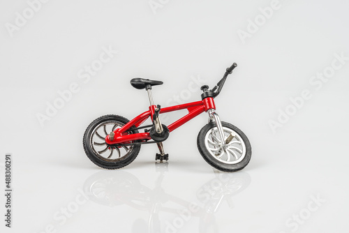 red bicycle isolated from white background