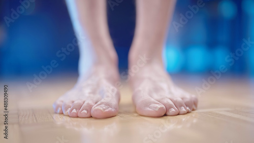 Person feet with toe deformity front view close up