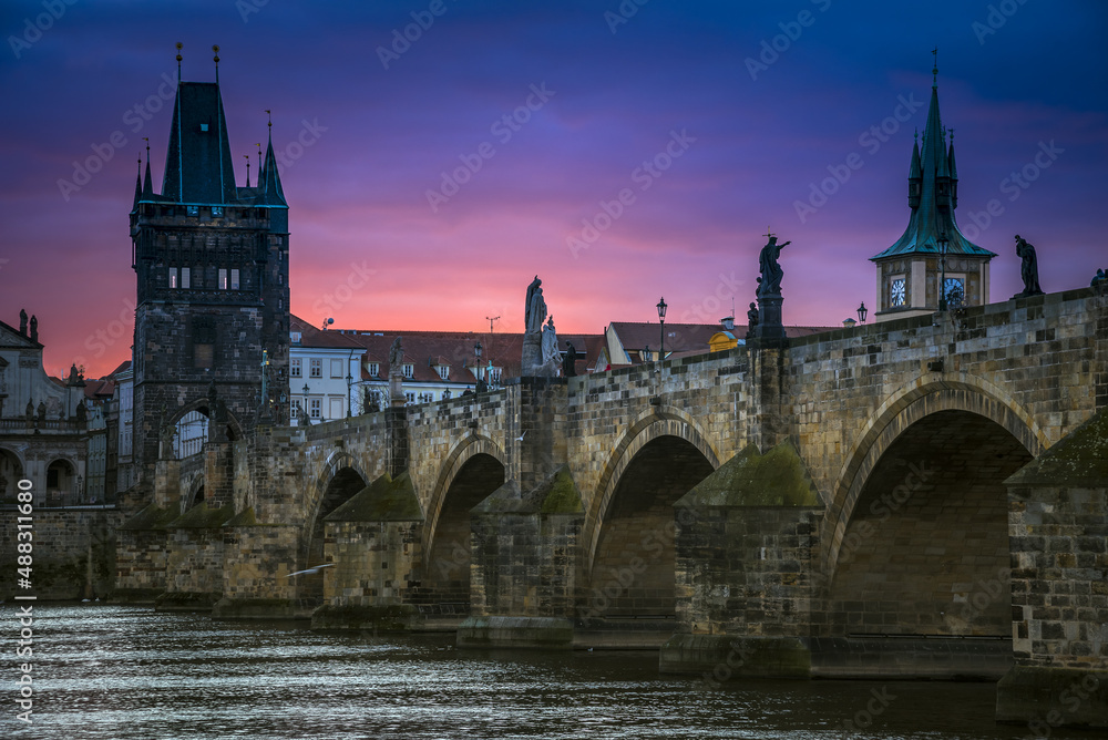 Scenic view of the mysterious Charles Bridge at sunrise