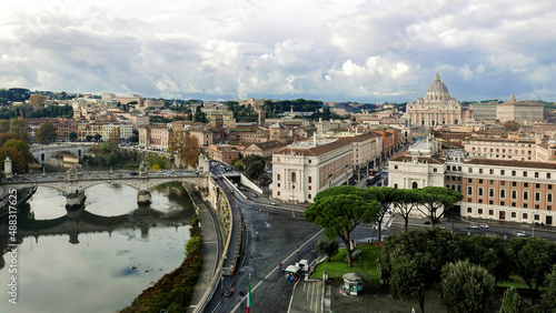 The city of Rome along the river Ron in the background with St. Peter's Cathedral in the Vatican 