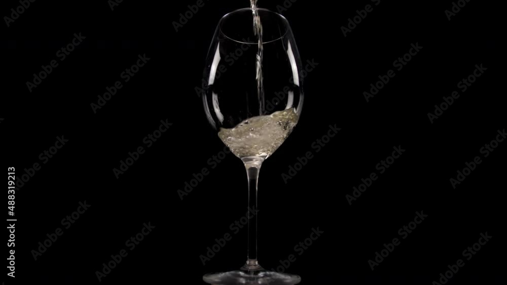 pouring white wine into glass slow motion 4k pouring white wine into glass slow motion 4k