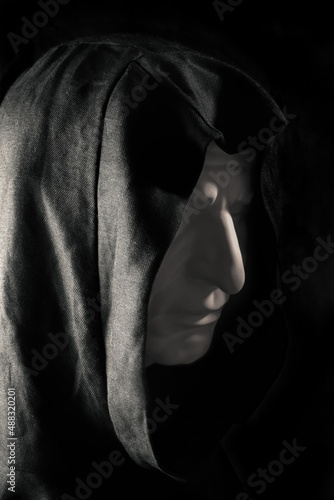 Fotografie, Obraz Concept mysterious portrait monk pastor gypsum head in hooded cape