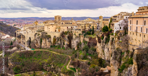 Impressive panoramic view of the city of Cuenca with its houses hanging on the precipice of the mountain.