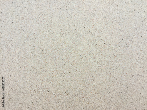 Background and texture of white sand on the beach. Pattern of sand.