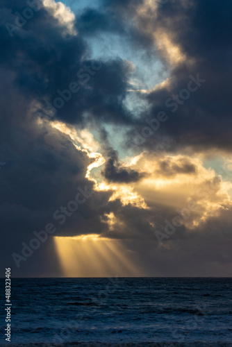 Sunset cloud formations with light rays