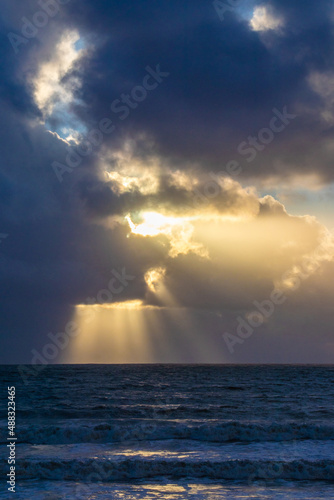 Sunset cloud formations with light rays © Dave