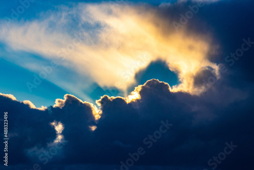 Sunset cloud formations with light rays