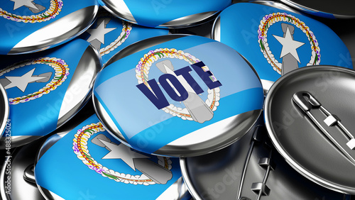 Vote in Northern Mariana Islands - national flag of Northern Mariana Islands on dozens of pinback buttons symbolizing upcoming Vote in this country. , 3d illustration photo