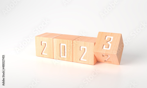 3d rendering of Business plan or Happy new year in 2023 concept for business strategy and development. Minimal wooden cubes "2022" to "2023" text on white background and copy space. Banner new plan.