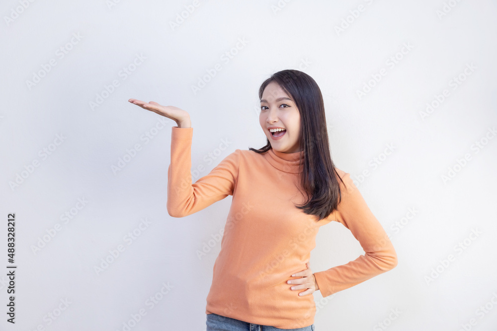 Asian Woman Presenting to Blank Space Asian Woman Presenting to Blank Space