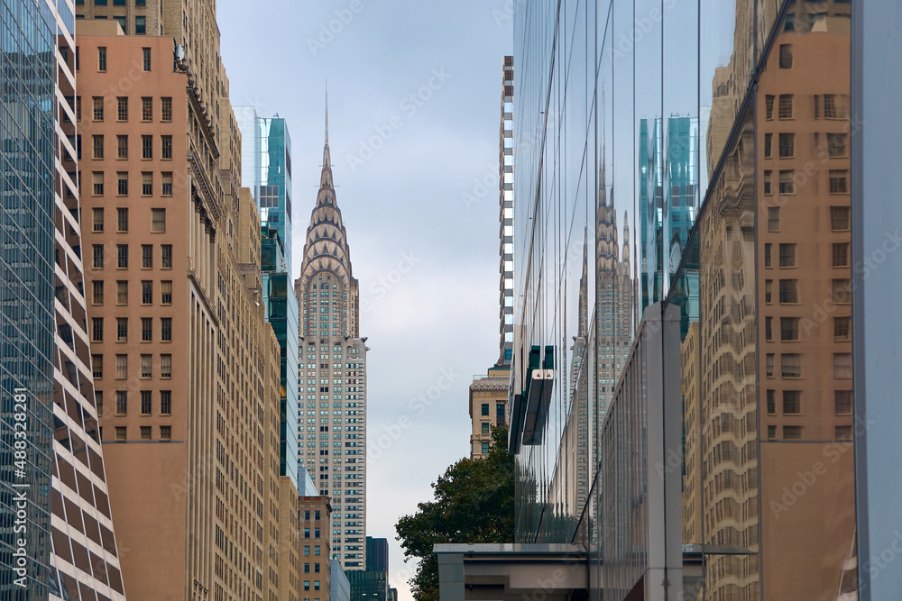 View of midtown Manhattan in New York City with landmark skyscraper Chrysler Building