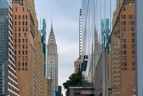 View of midtown Manhattan in New York City with landmark skyscraper Chrysler Building