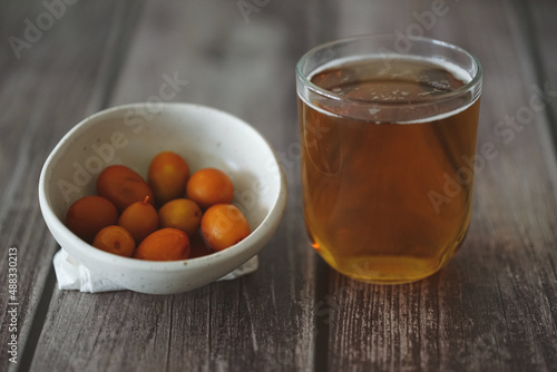 Image of a cold beer along with some olives