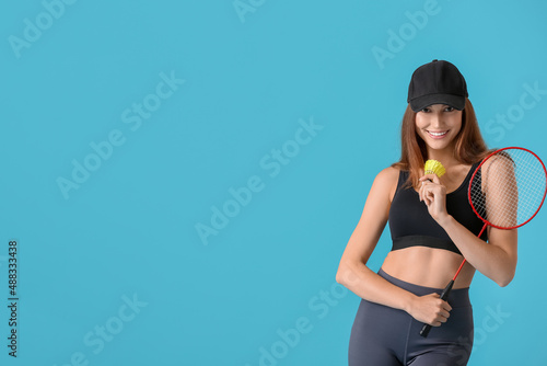 Sporty female badminton pla...