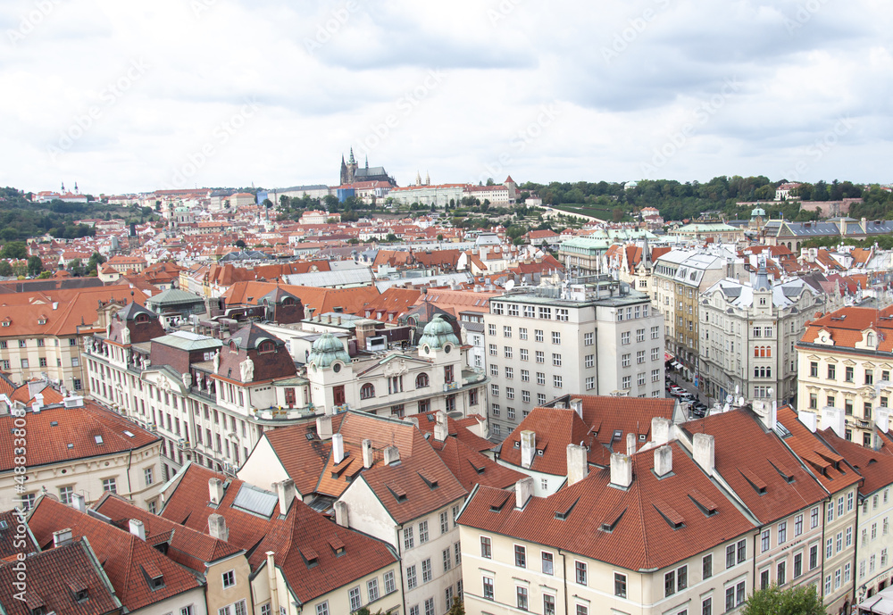 Top view to red roofs skyline of Prague city, Czech Republic. Aerial view of Prague city with terracotta roof tiles, Prague, Czechia. Old Town architecture with  roofs in Prague