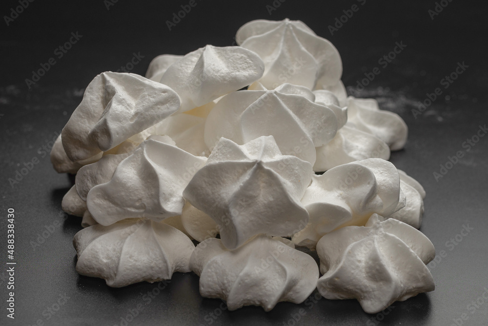 White tasty meringue, homemade dessert. White tasty meringue, homemade dessert.
