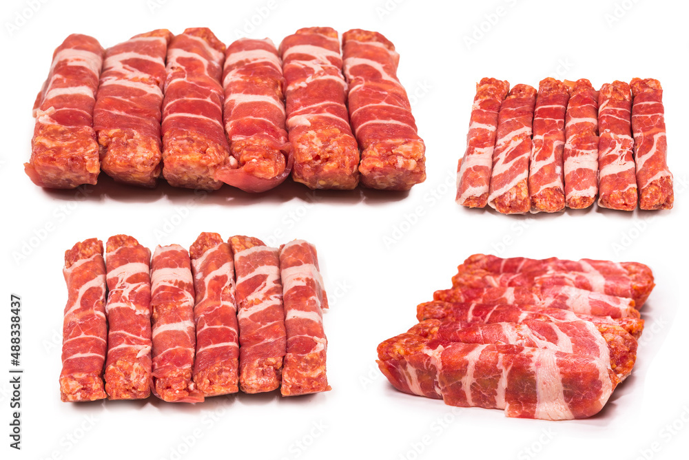 Chevapchichi in bacon isolated on white background. Chevapchichi in bacon isolated on white background.