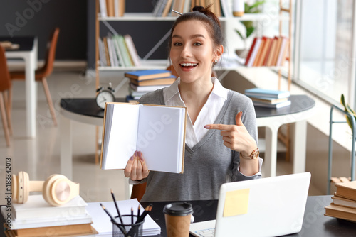 Beautiful young woman study...