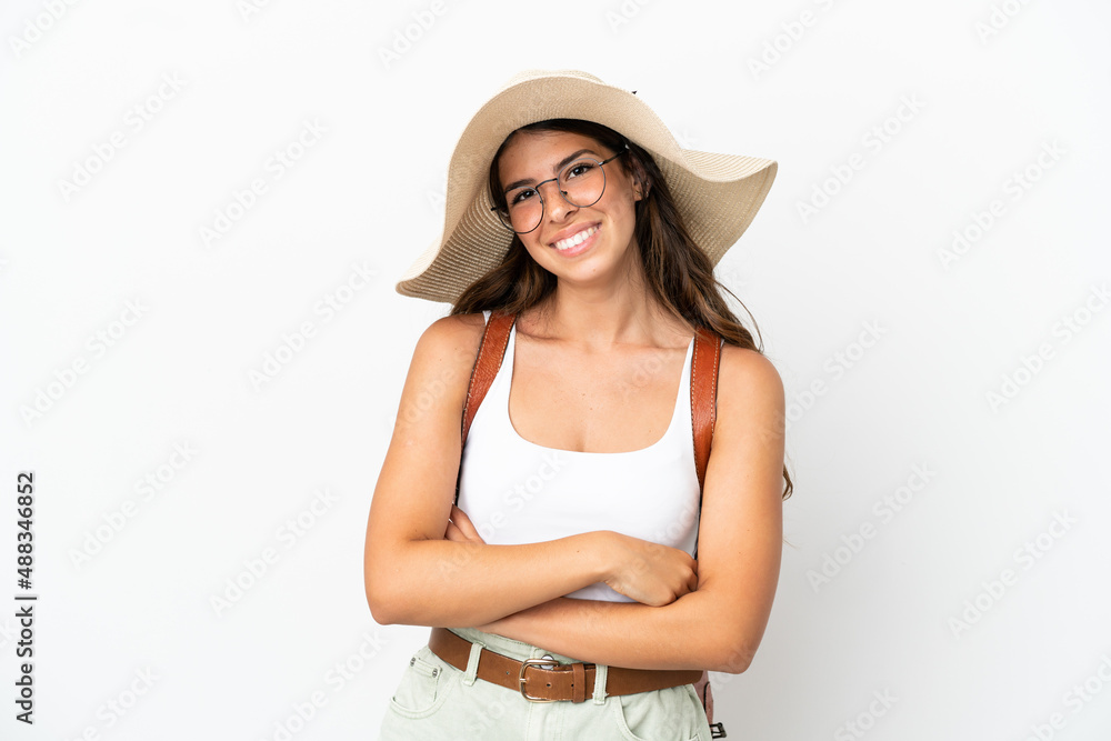 Young caucasian woman wearing a Pamela in summer holidays isolated on white background with glasses and smiling Young caucasian woman wearing a Pamela in summer holidays isolated on white background with glasses and smiling
