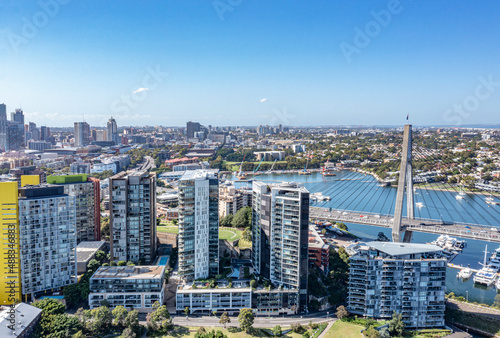 Aerial drone view of Anzac Bridge looking toward Pyrmont in Sydney  Australia on a sunny morning   