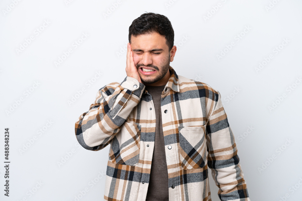 Young Brazilian man isolated on white background with toothache Young Brazilian man isolated on white background with toothache
