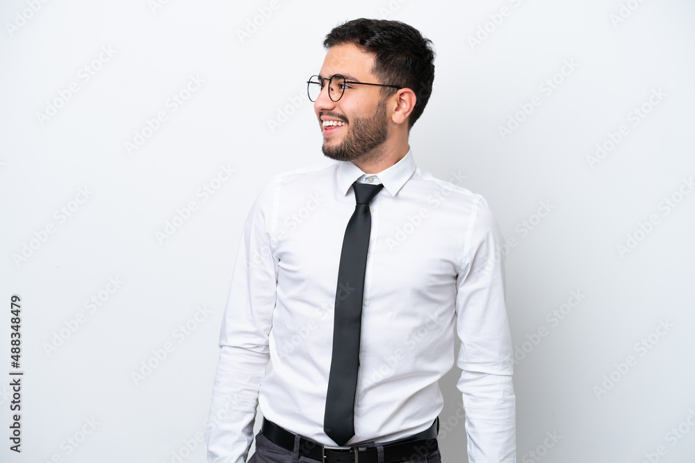 Business Brazilian man isolated on white background looking side Business Brazilian man isolated on white background looking side