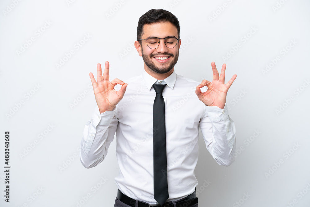 Business Brazilian man isolated on white background in zen pose Business Brazilian man isolated on white background in zen pose