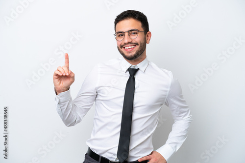 Business Brazilian man isolated on white background showing and lifting a finger in sign of the best