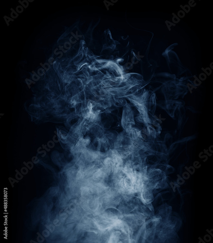 Smoke over black background. Fog or steam texture.