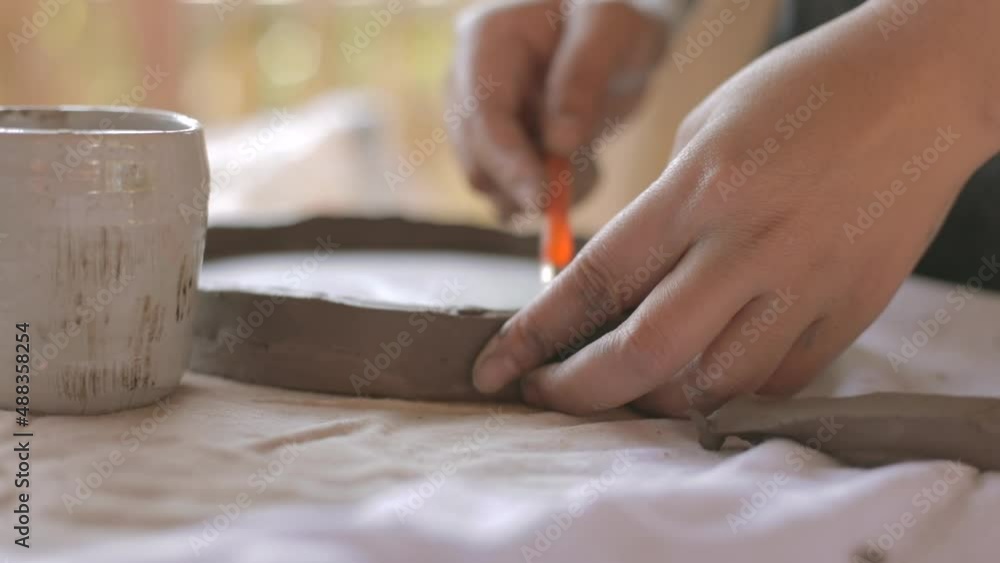 Close-up the artist makes ceramic potter
Close-up the artist makes ceramic potter