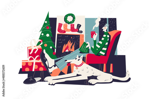 Man and dog relaxing near fireplace at home